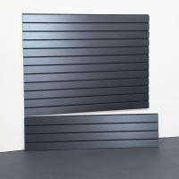 Steel gray slatwall panel installed in a clean garage with organized tools and accessories