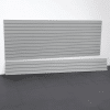 Upgrade your garage with the sleek 8ft Textured Grey Laminated PVC Slatwall from Milwaukee Slatwall, your solution for a durable and stylish storage space.