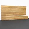 Garage slatwall panel in Aspen Maple finish with hooks, baskets, and shelf accessories