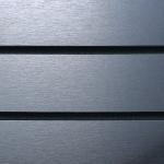 Steel gray slatwall swatch sample with smooth modern industrial finish