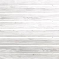 Durable Whitewood PVC inserts for slatwall panels, enhancing visual continuity and functionality in garage setups.