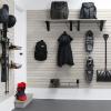 Organized garage with MKE Slatwall panels, hooks, and accessories for winter storage