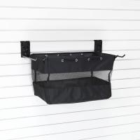 Small storage tote bag attached to slatwall with tools inside